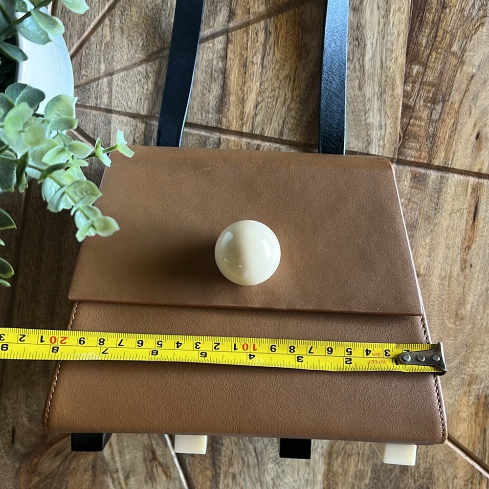 MATTER MATTERS GALLERY
MINI TRAPEZOID SHOULD BAG - BROWN Leather Crossbody Bag - Picture 12 of 16